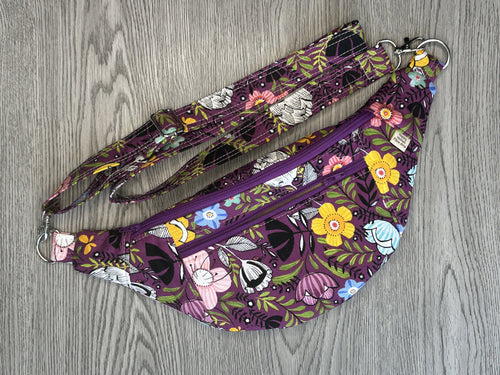 Fanny Pack Medium Size  Purple Fabric with Abstract flowers in yello, white, pink, black, blue and green leaves with Nickel Hardware