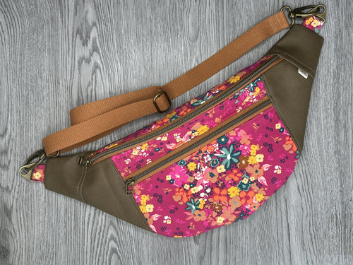 Hot Pink Fabric, multi colored flowers, Mocha Vinyl , cream liner and webbing strap  Large Fanny Pack 