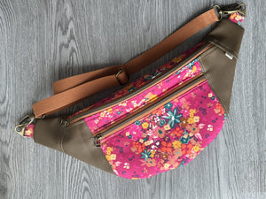 Hot Pink Fabric, multi colored flowers, Mocha Vinyl , cream liner and webbing strap  Large Fanny Pack 